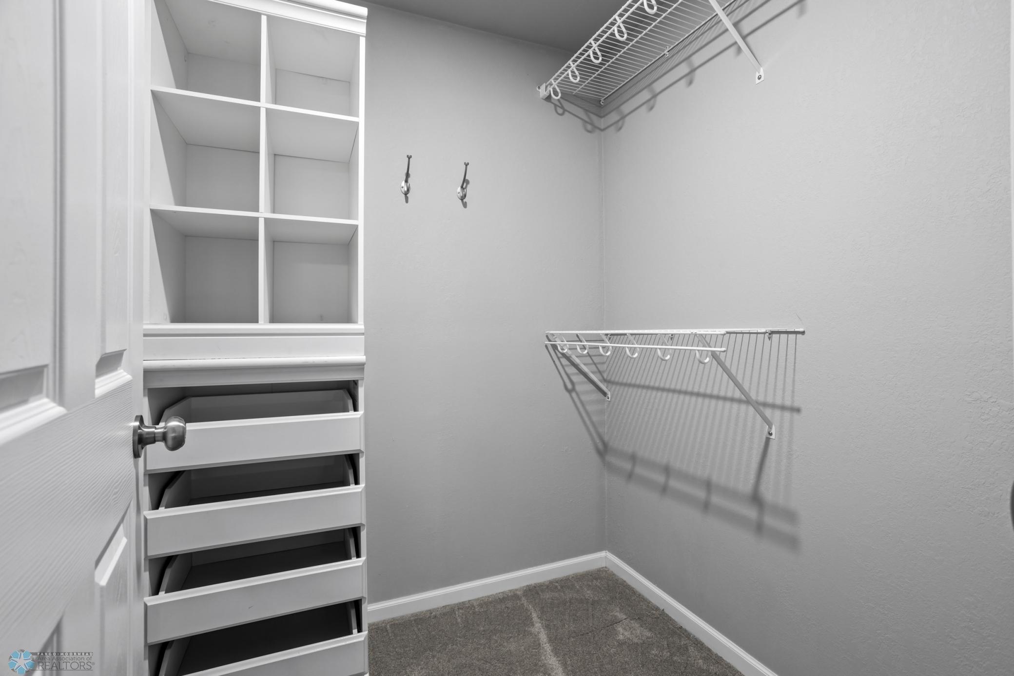Walkin Closet - 5th Bedroom - Custom Shelving stays