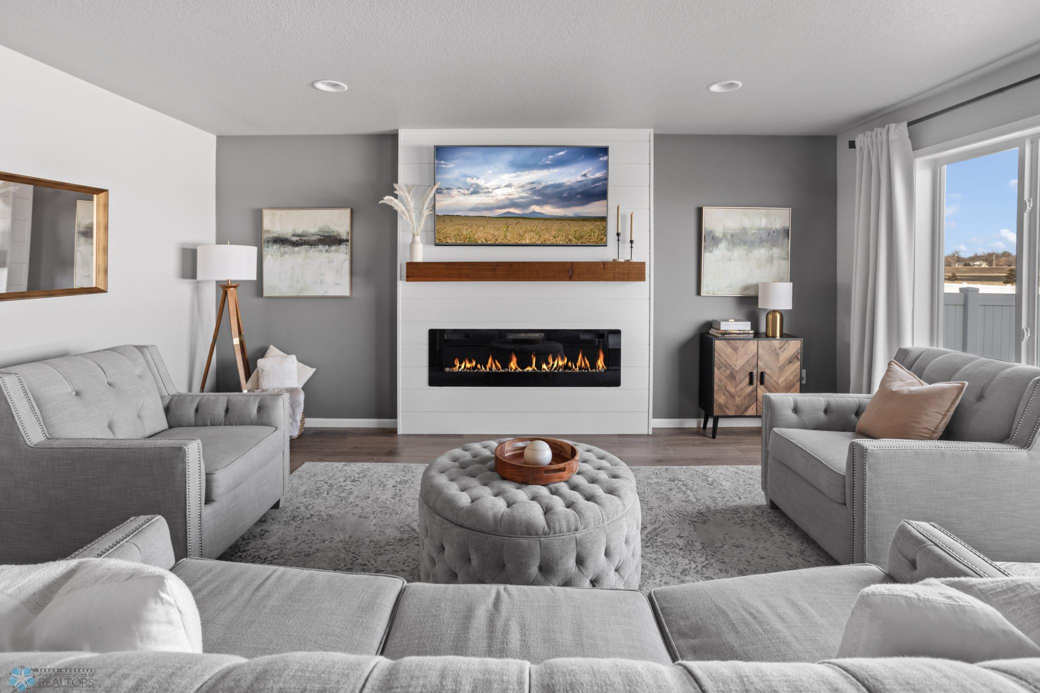Main Level Grand Living Room - Tv's stay