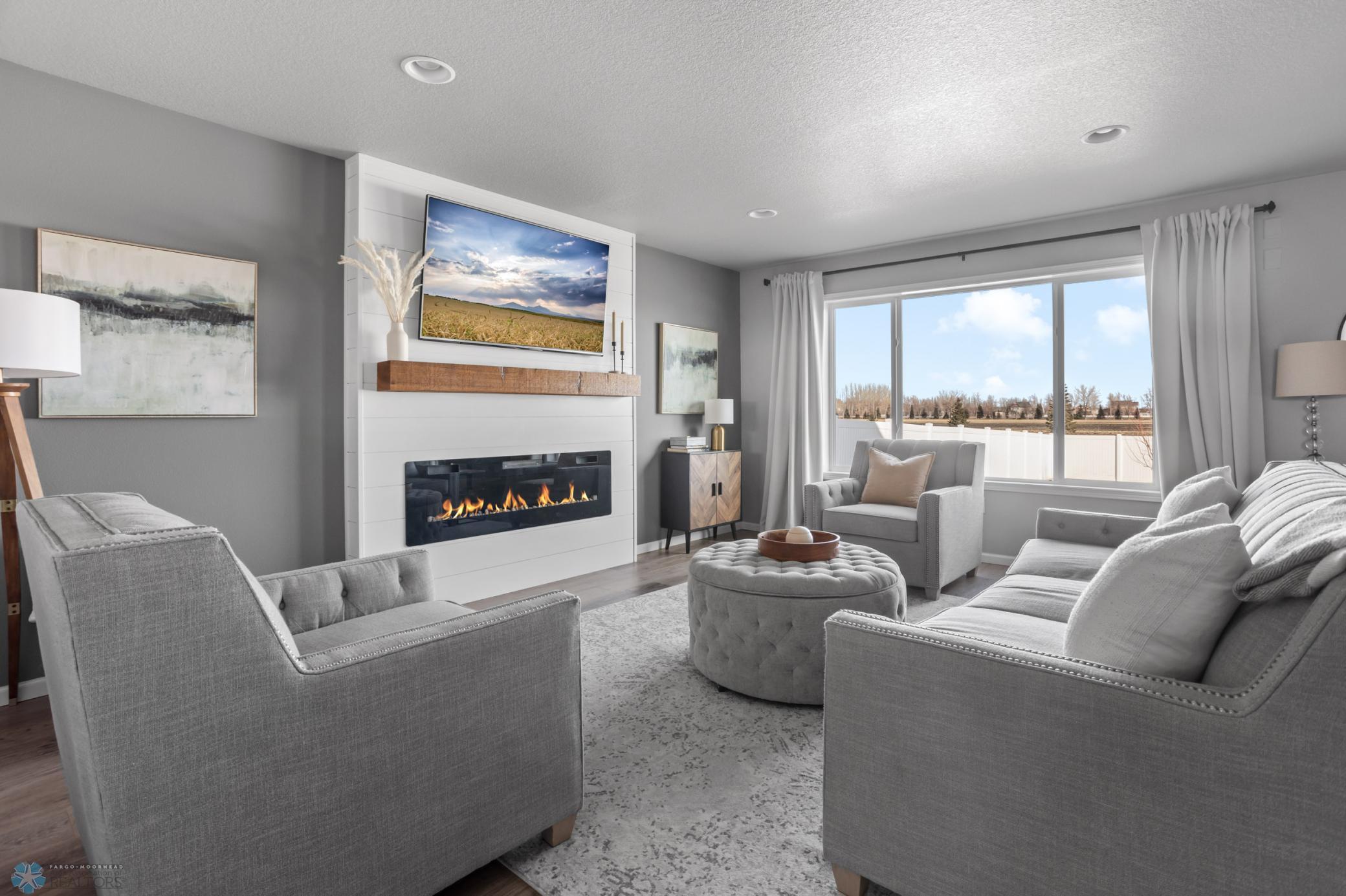 Main Level Grand Living Room - Tv's stay
