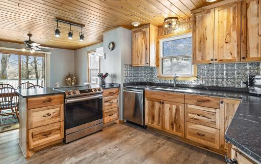 Beautiful kitchen with custom made cabinets.