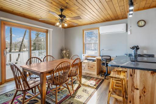 Dining Room with a patio door to the lakeside deck.