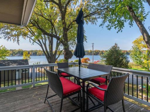 West facing deck with large mature, trimmed trees