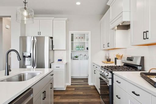 Photo of previously completed Reiley Model. Completion for this home expected July 2025.
