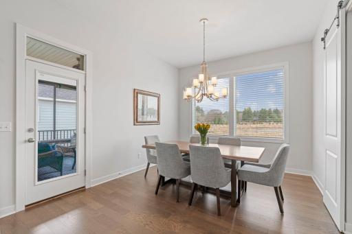 Dining with access to screened in porch.