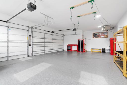 Oversized, insulated, heated and finished Garage. Floor drains and Epoxy floors