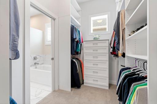 Large Walk-In Closet with California Closets