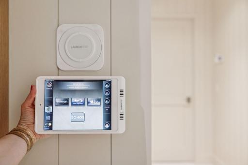 One of the home's wireless charging and control hubs â manage security, climate, lighting, and entertainment from a single device.