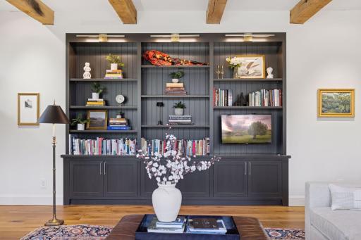 Dimmable art lights thoughtfully placed throughout the home