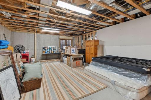 This unfinished space is the perfect spot for an additional bedroom, already plumbed for an adjoining bath
