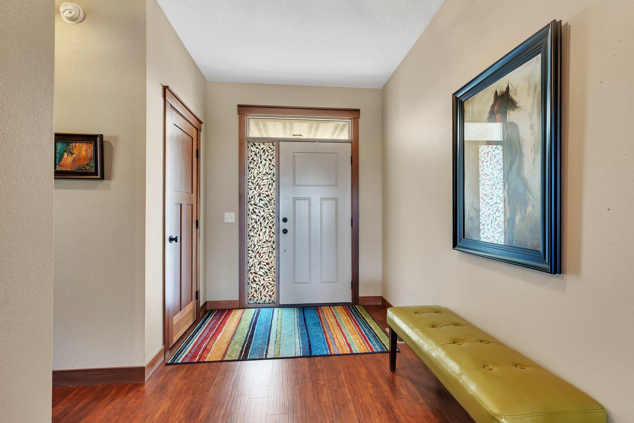 Spacious foyer with large entry closet.