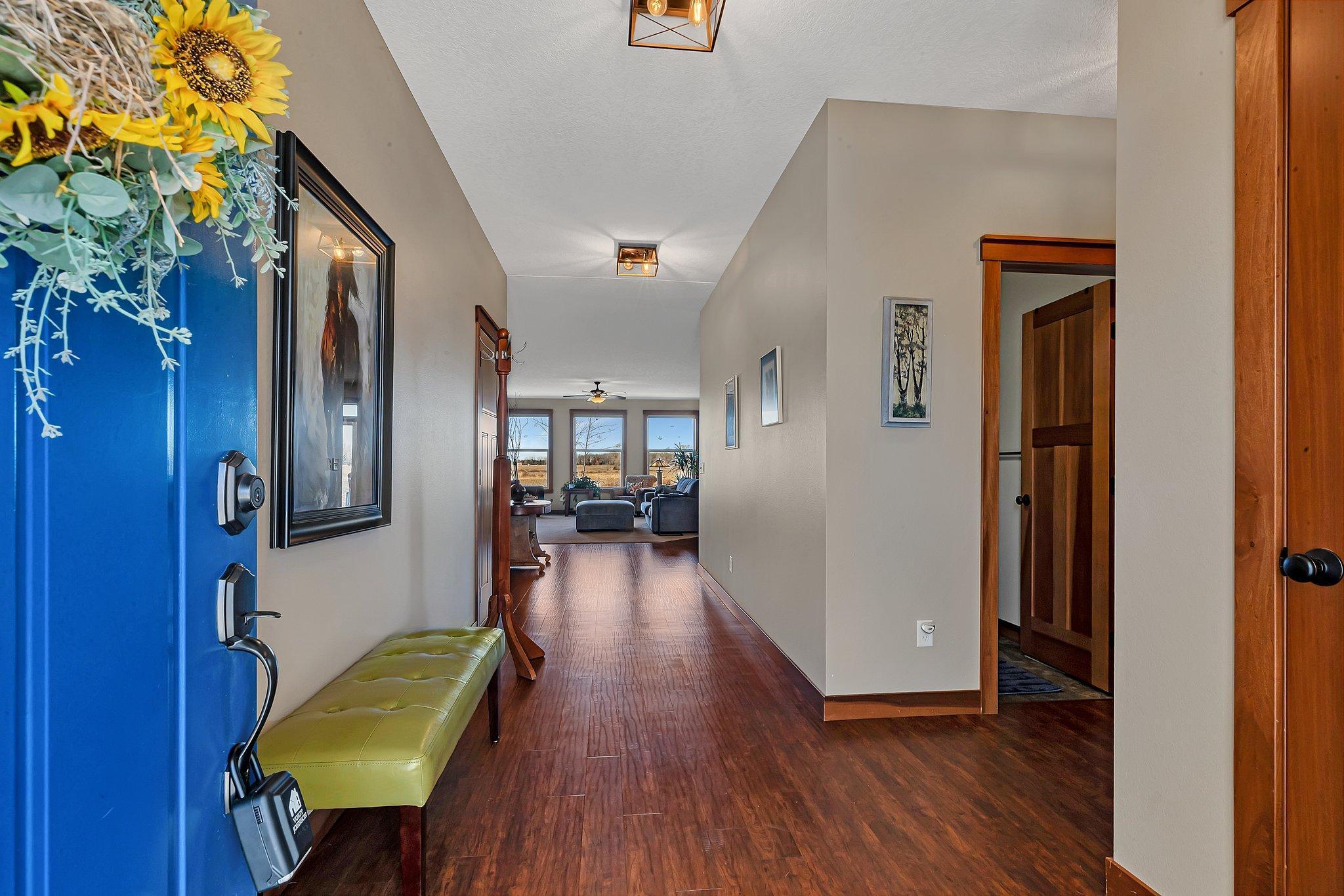 Airy and bright entrance with immediate views through the home to the back yard.