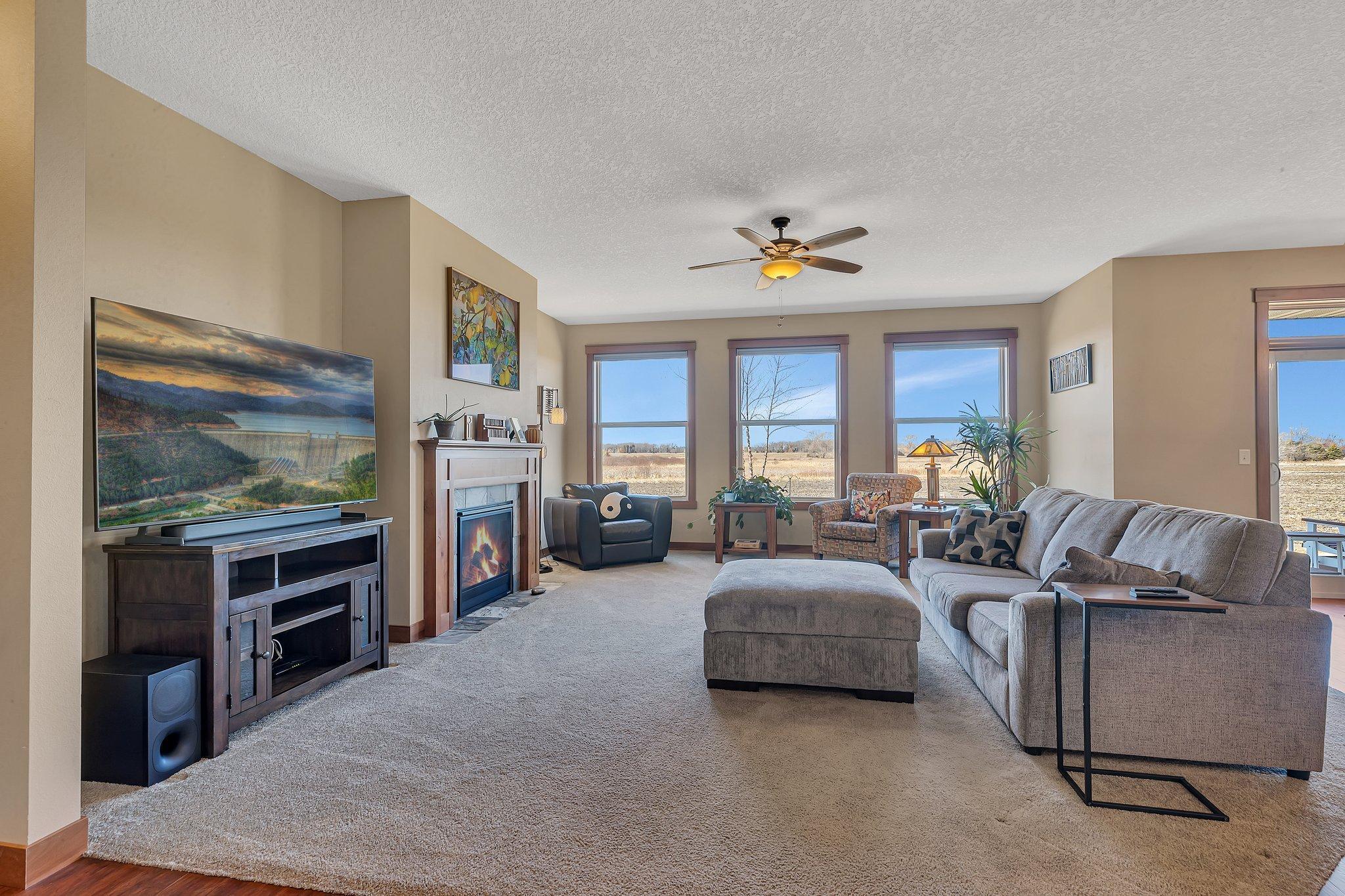 Expansive windows allow tons of natural light to flood the living room.