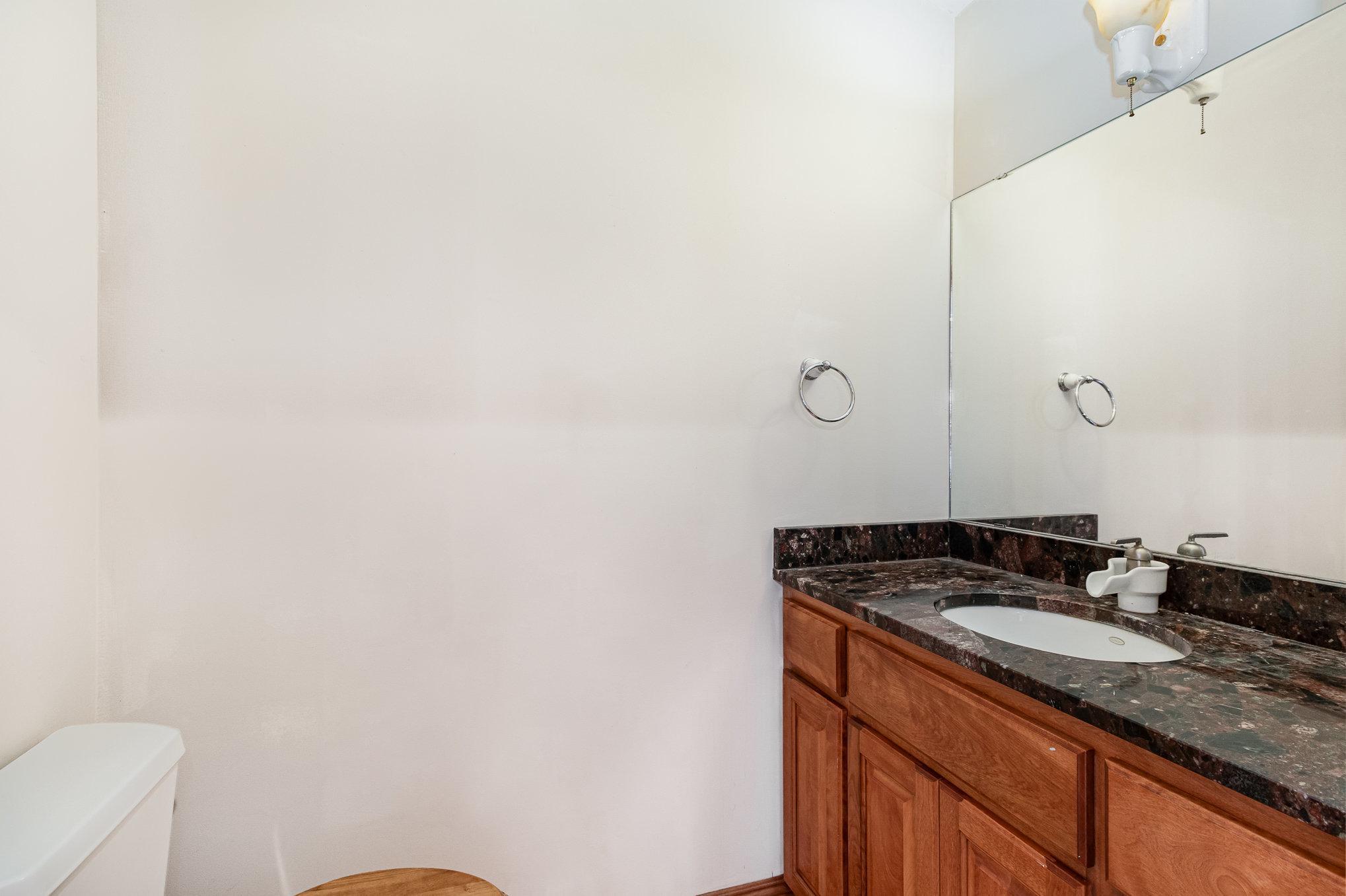 This is your 3rd bathroom located in the upper level of the home adjacent to the wet bar. Please see floor plans.