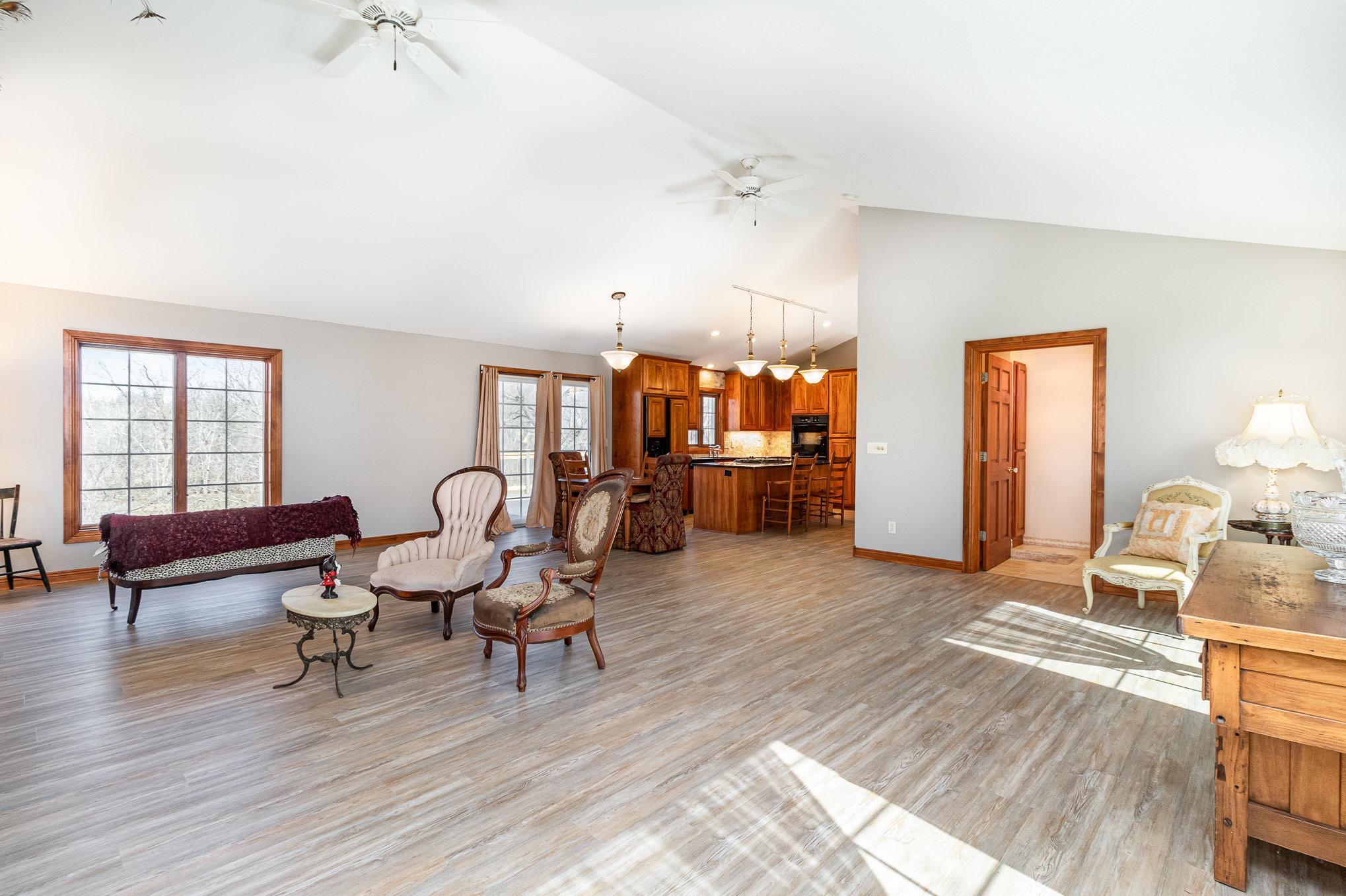 With generous space and seamless flow into the kitchen, this area creates a warm and connected atmosphere for everyday living.