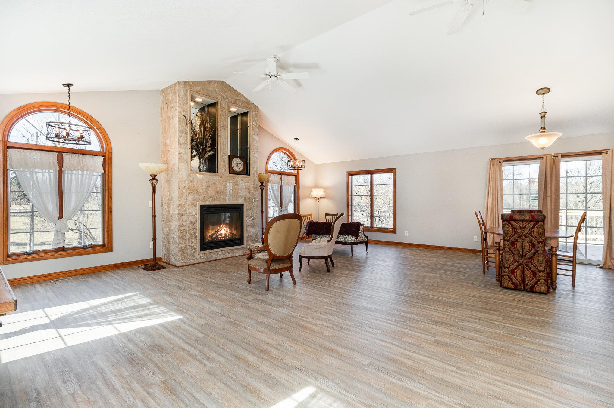 The main level features brand-new LVP flooring bringing a cozy feel to this living space.