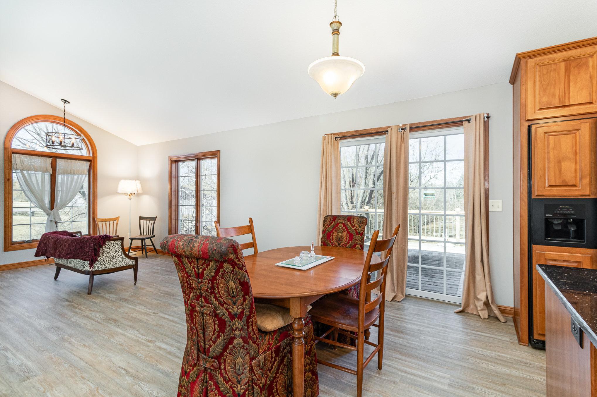 The main-level living room offers an open and inviting layout, perfect for both relaxation and entertaining.