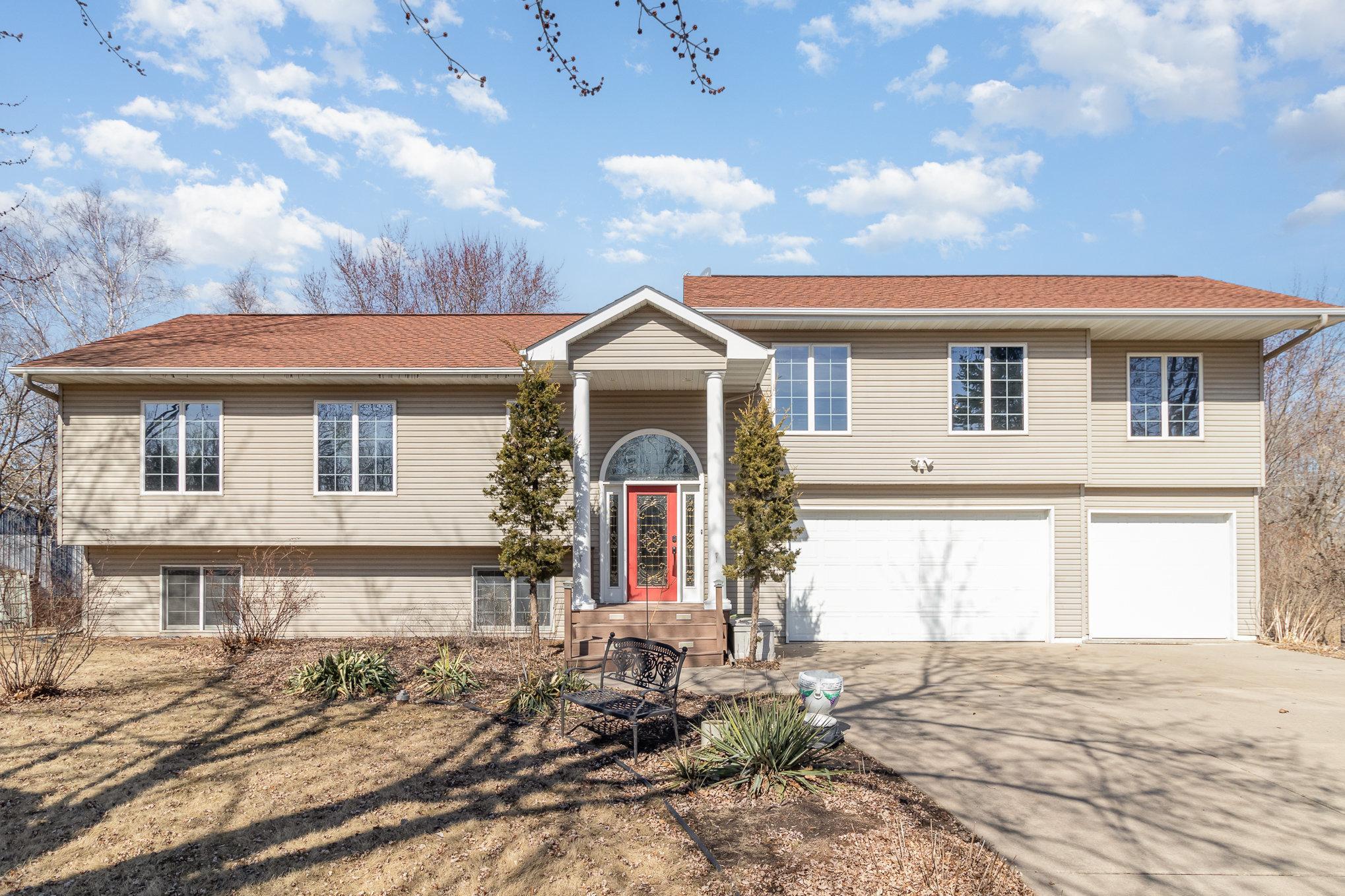 This home has a ton of curb appeal and you will love this property even more in the summer months and fall when the foliage is at its full bloom.