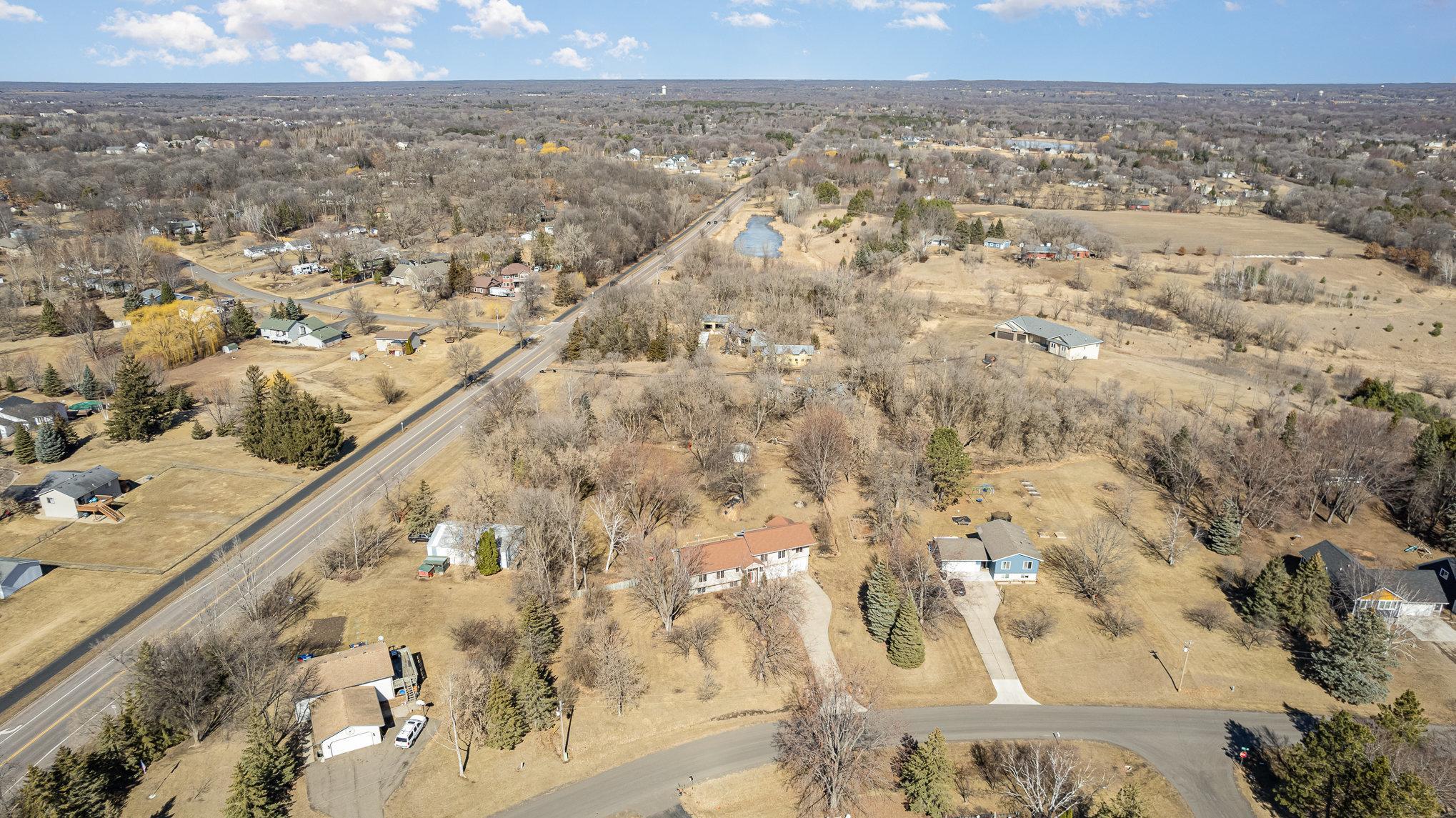 The 1.2-acre lot provides plenty of room to enjoy outdoor activities while maintaining a peaceful, open feel.