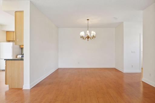 Formal dining room that opens to the living