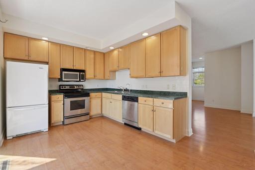 Great space in the kitchen to add an island. Open up to living and dining room.