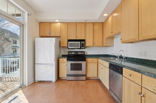 Kitchen with slider doors to walkout deck