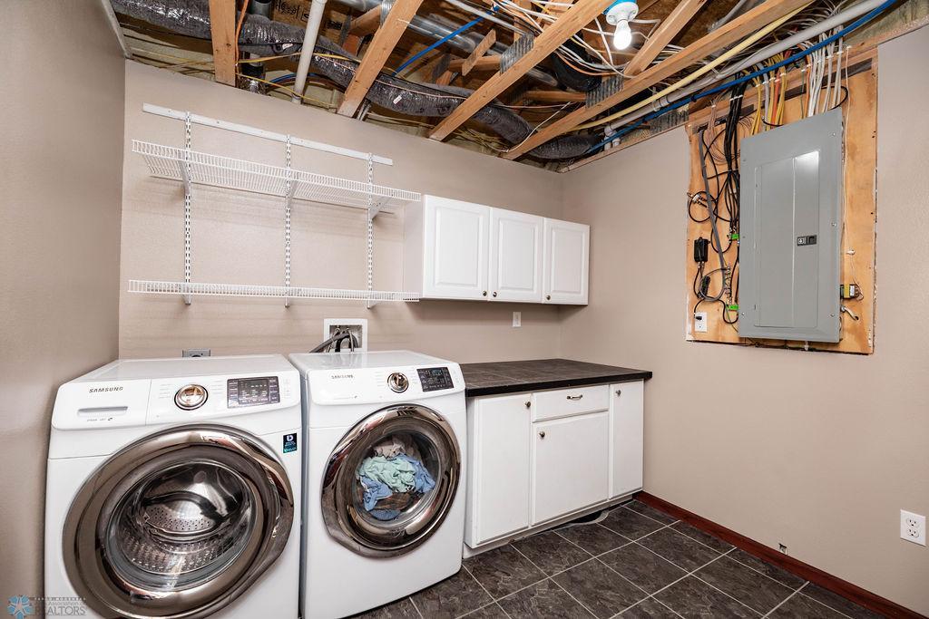 Spacious Laundry Area with Folding Counter