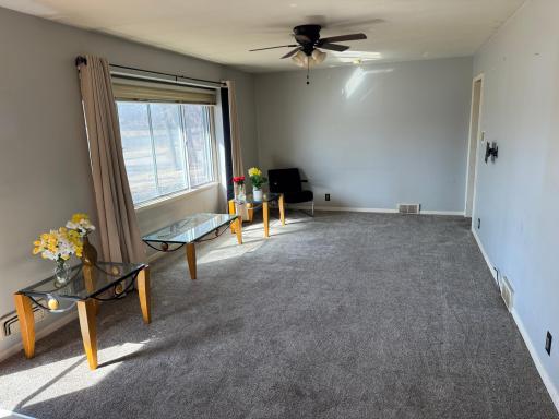 Living room faces west and overlooks the pond!