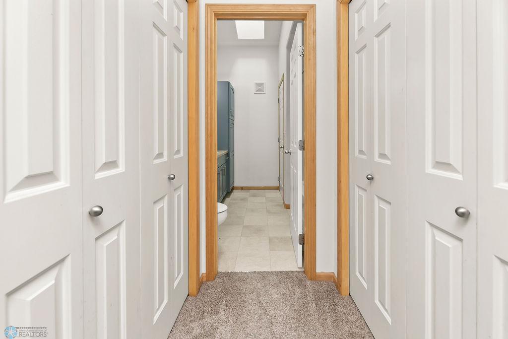 Closets between primary bdrm & bath