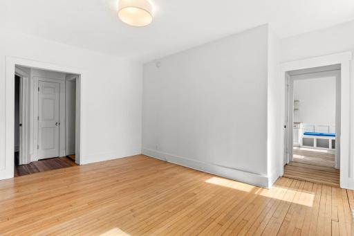 Main level formal dining room with abundance of natural light.