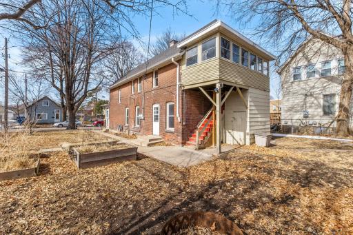 View from back of lot featuring the rear porch and entrance.