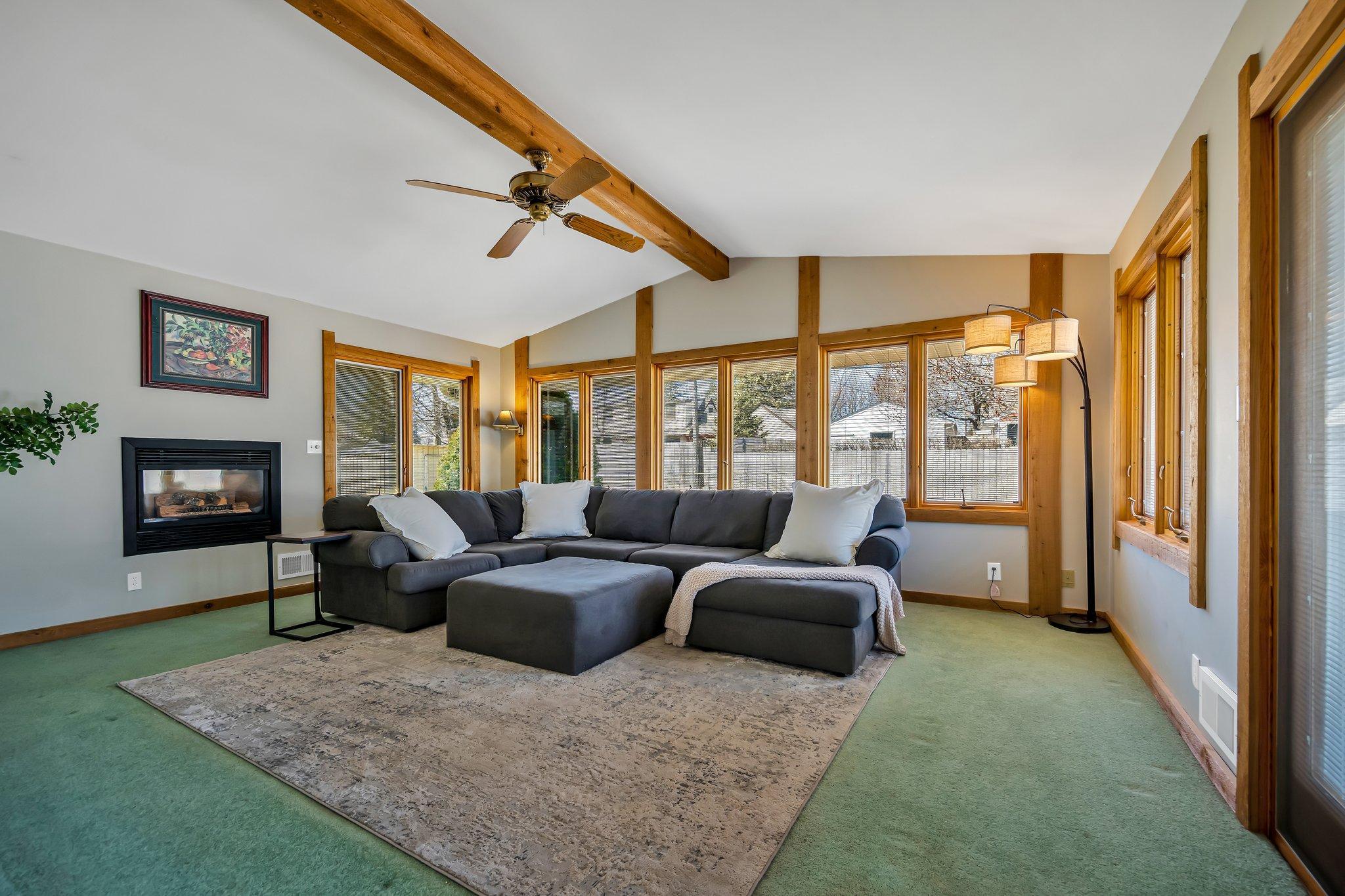 4 season porch with gas fireplace! Sliding doors also lead to the backyard!