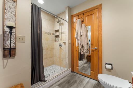 New LVP flooring and tile floor in shower