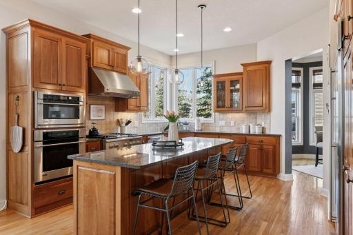 Beautiful gourmet kitchen with seating at the island.