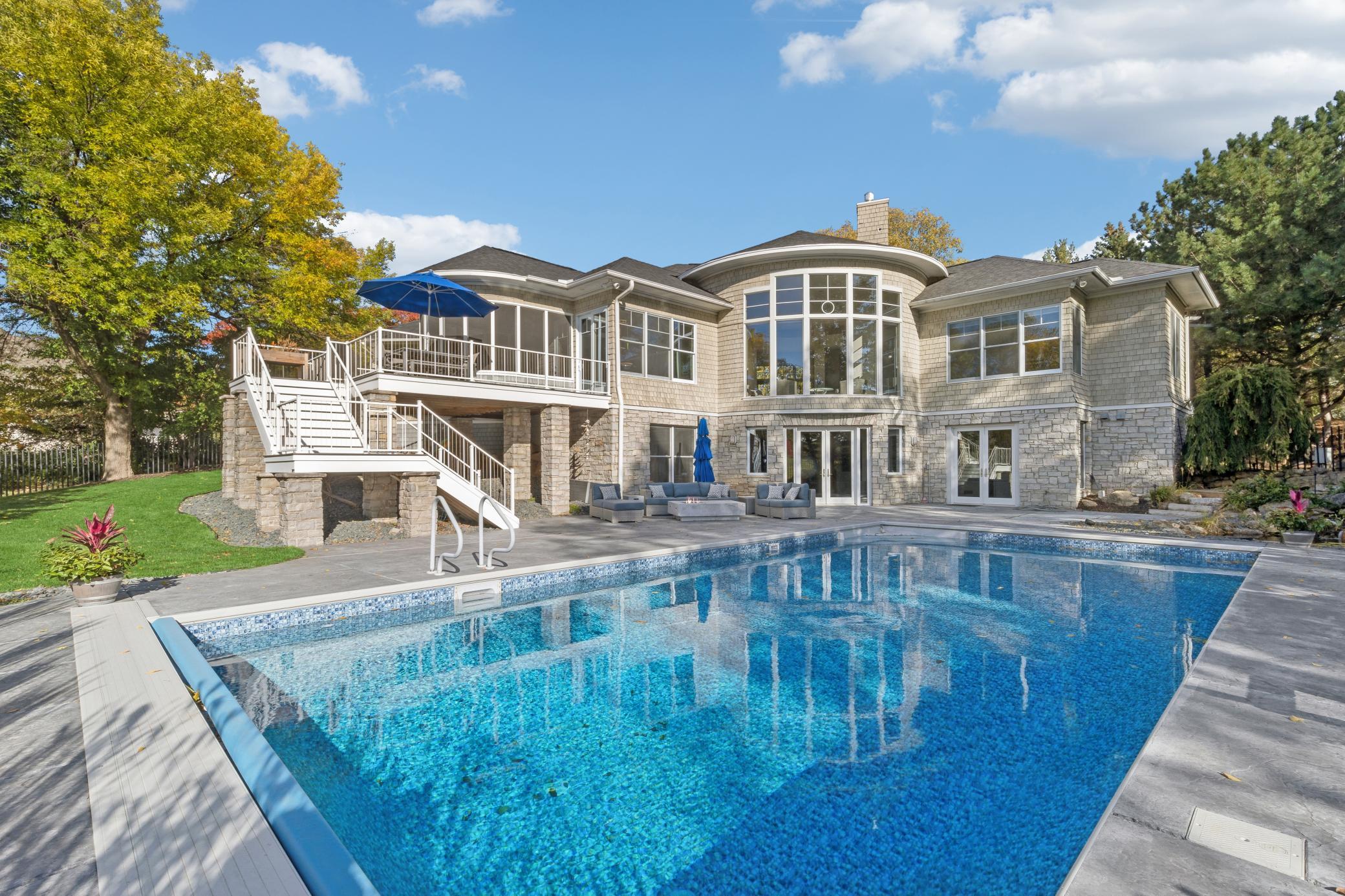 Get ready to be captivated by this flawlessly designed Keith Waters custom masterpiece perfectly nestled in the highly desired Bearpath Community.