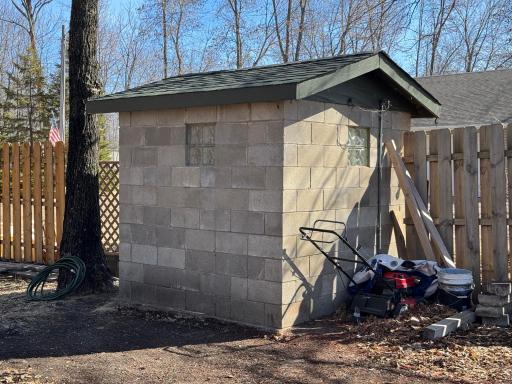 Another angle of the shed with a bit of privacy fencing along this part of the south side of property.