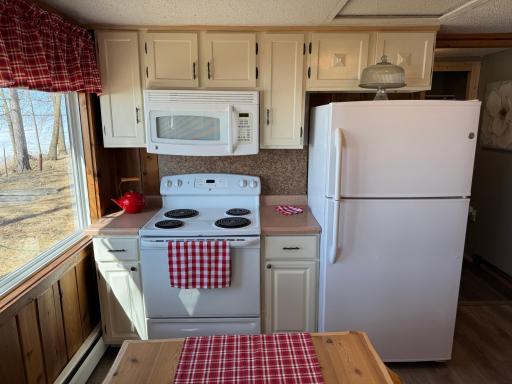 A closer look at the kitchen appliances, nicely tucked in the corner.