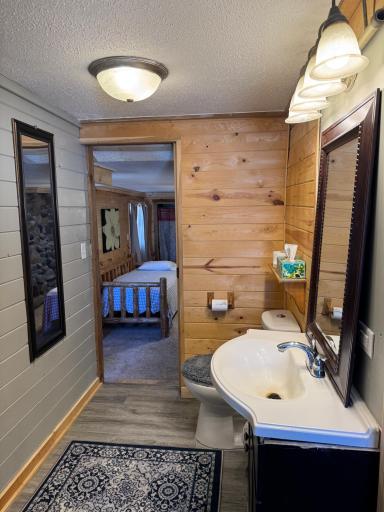 One more look at the bathroom with the bedroom beyond.