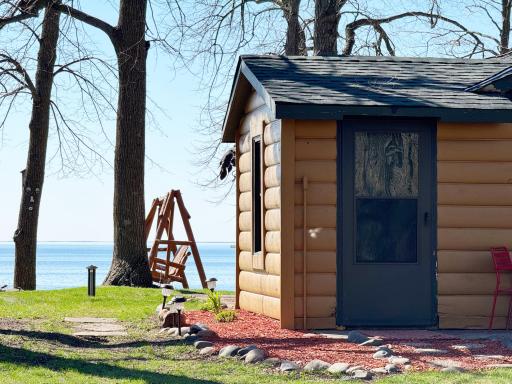 Freshly painted cabin, newer roof, remodeled kitchen and bathroom, interior ceilings freshly painted/re-done - this a great spot to hang out and enjoy the big lake while you contemplate your future building plans!