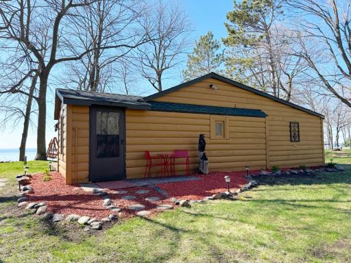 Closer view of the cabin showing the rear entry door that leads into the cabin's entry porch...