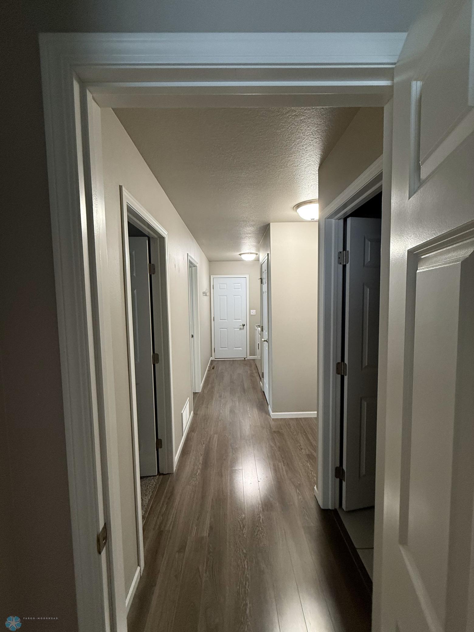 hall view from master to laundry and other bedrooms