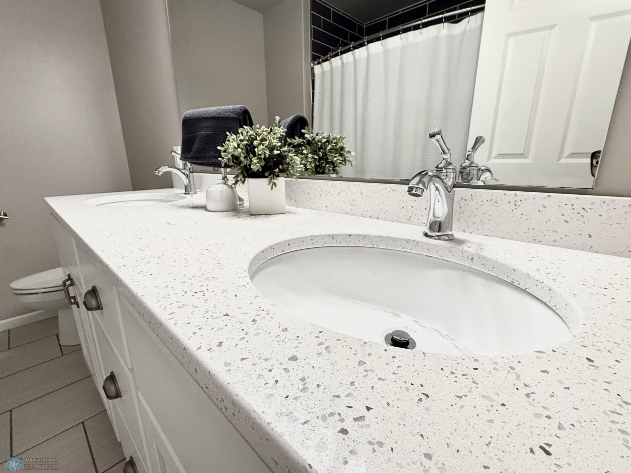 quartz countertops in master bath.jpeg