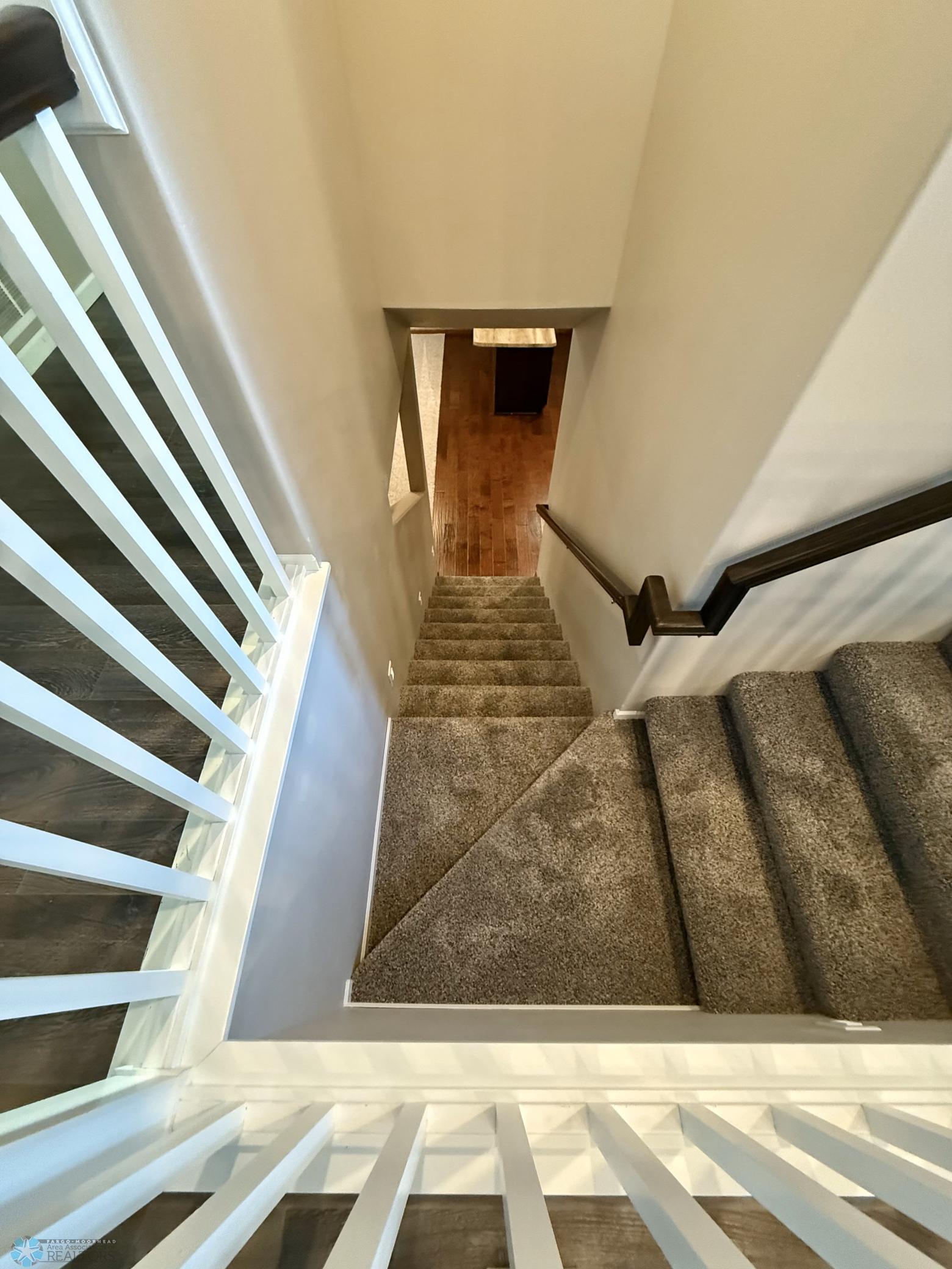 stairs going down to lower level.jpeg