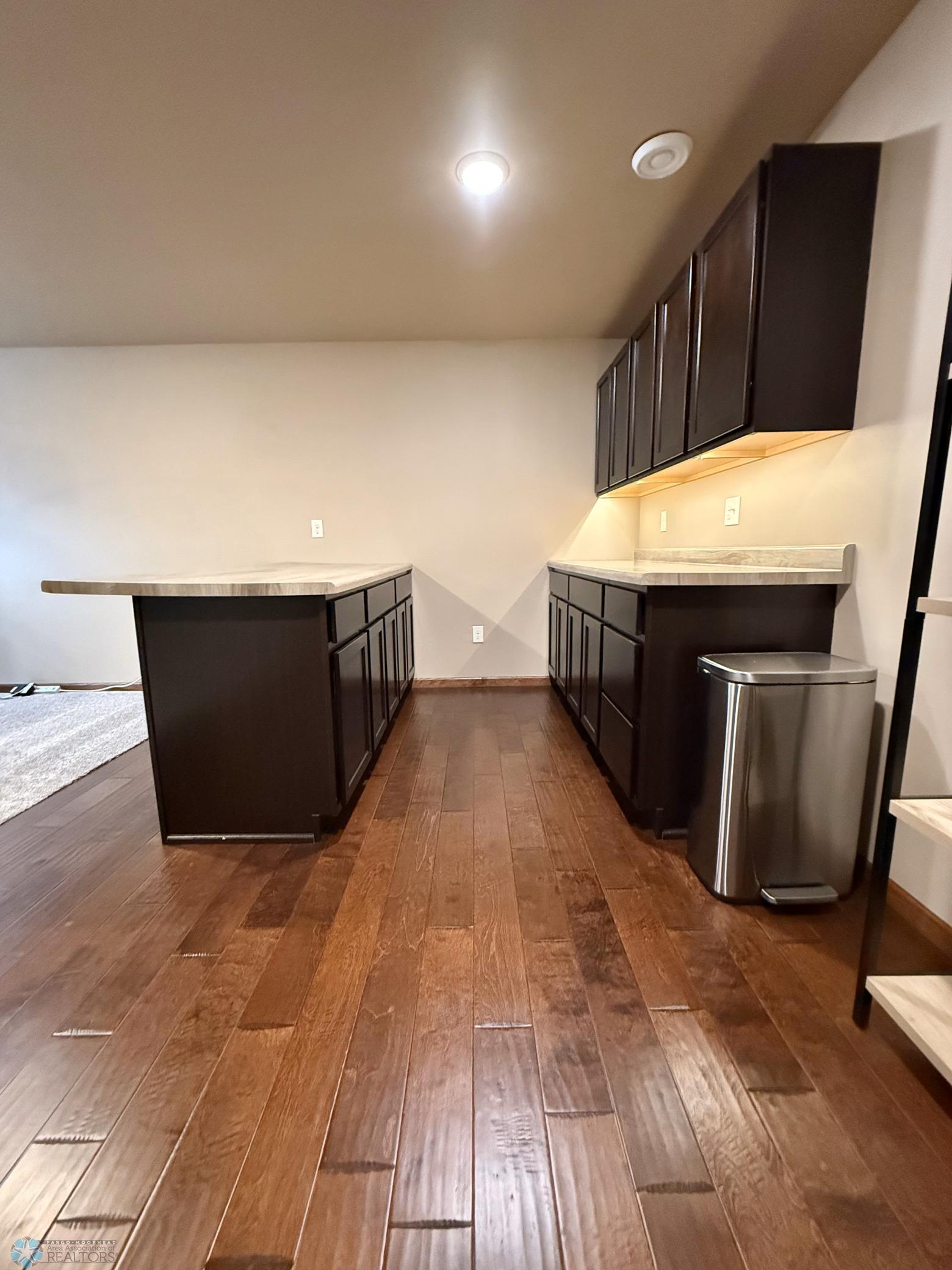 entertainment area showing wood floor .jpeg