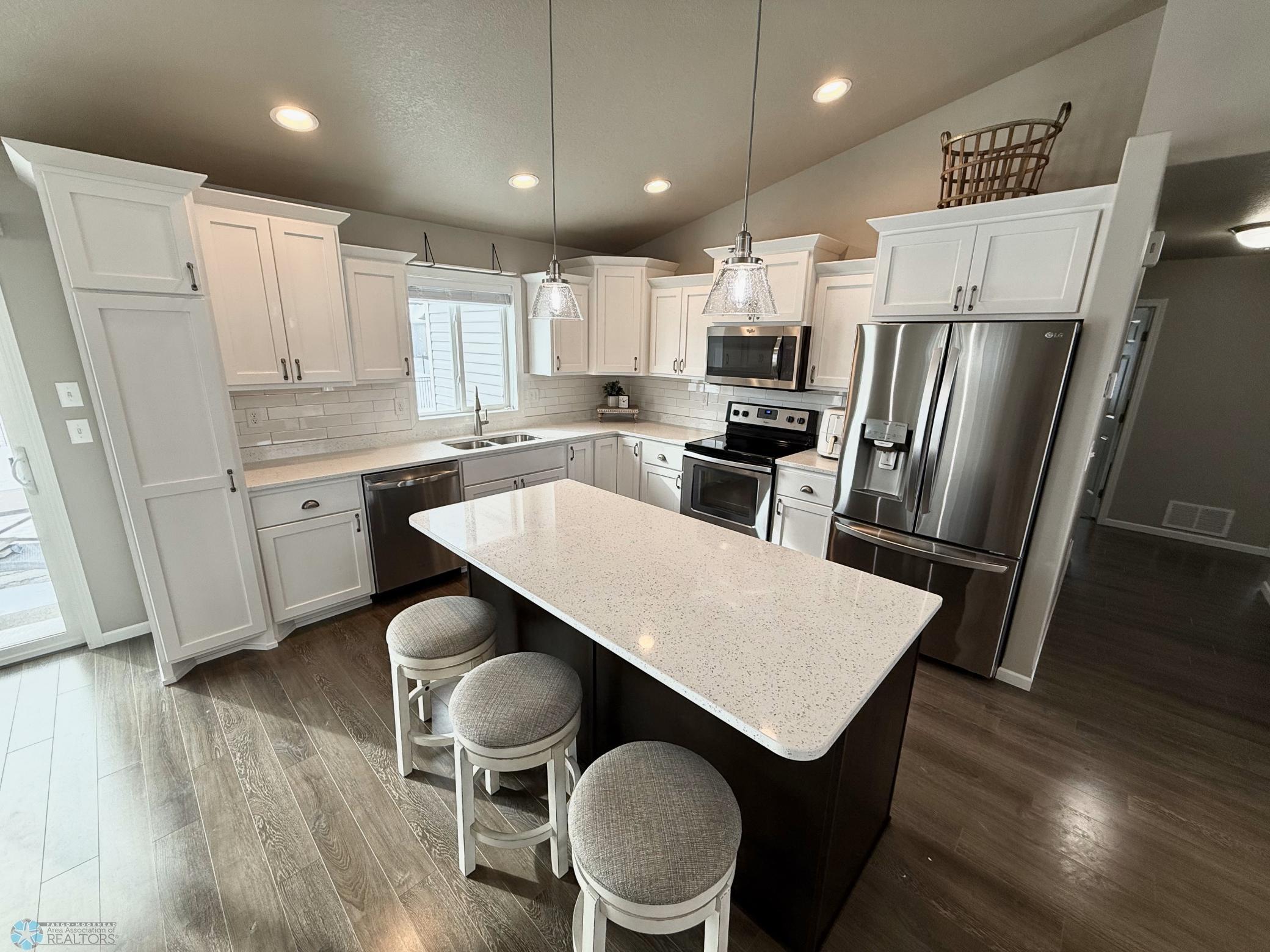 kitchen showing island with pendants.jpeg