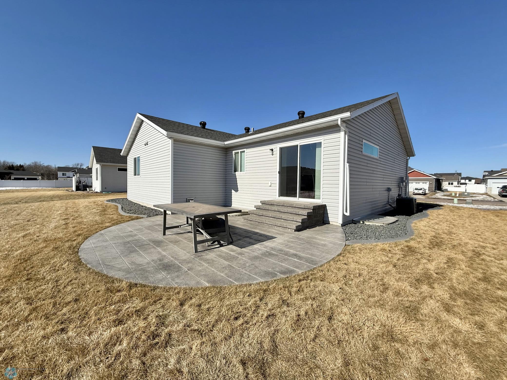 SE corner of house showing size of patio.jpeg