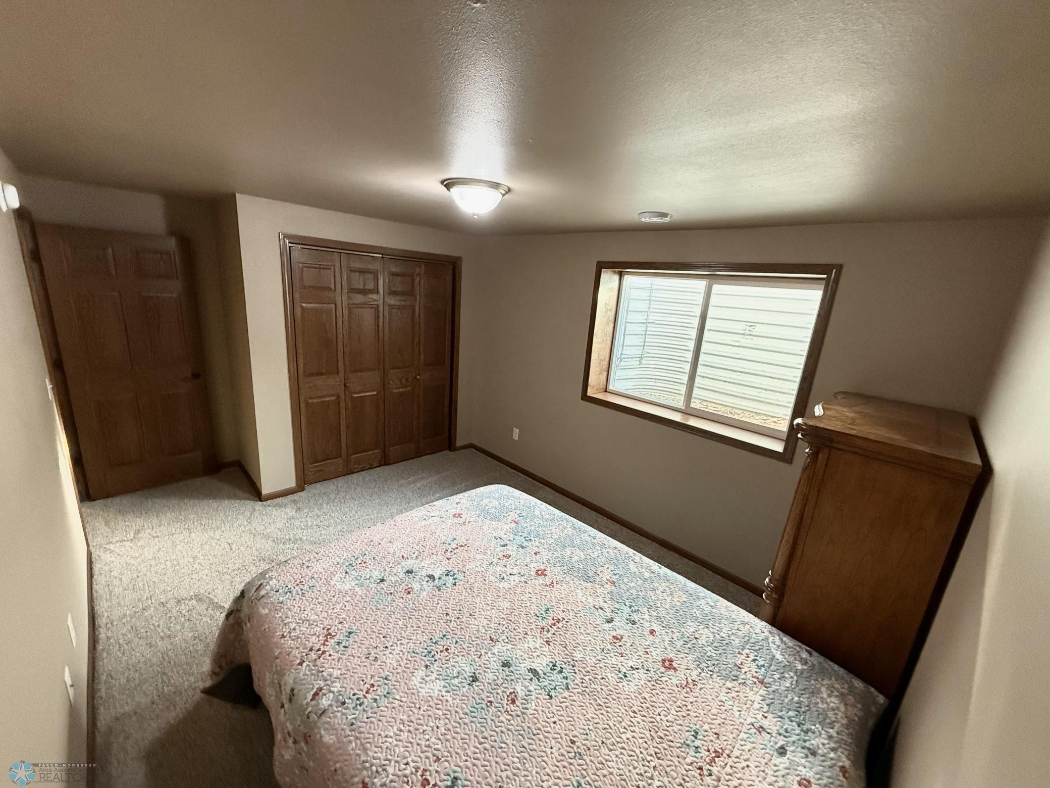 view of bedroom 5 toward closet.jpeg