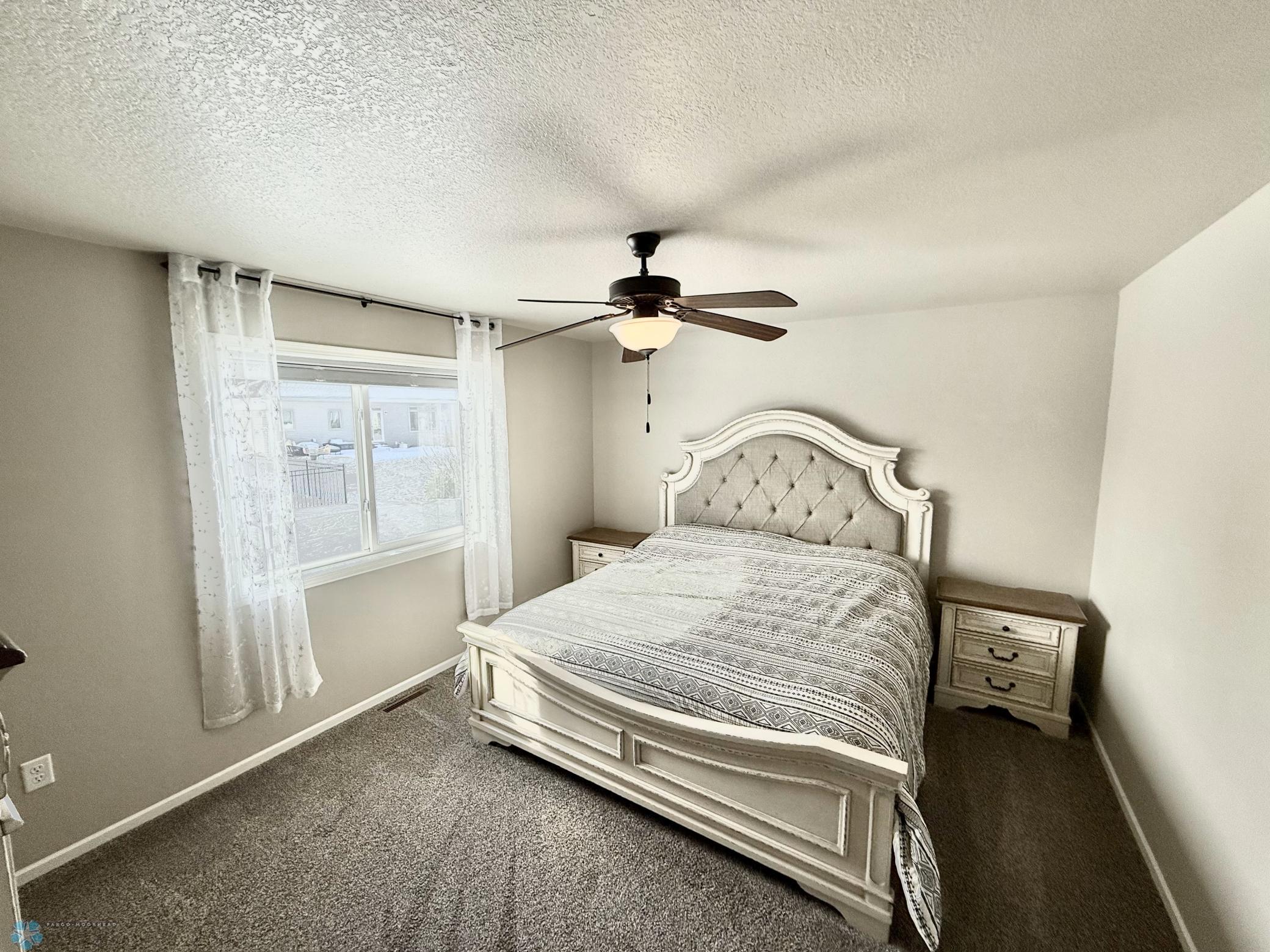 large master bedroom has space for king size bed.jpeg