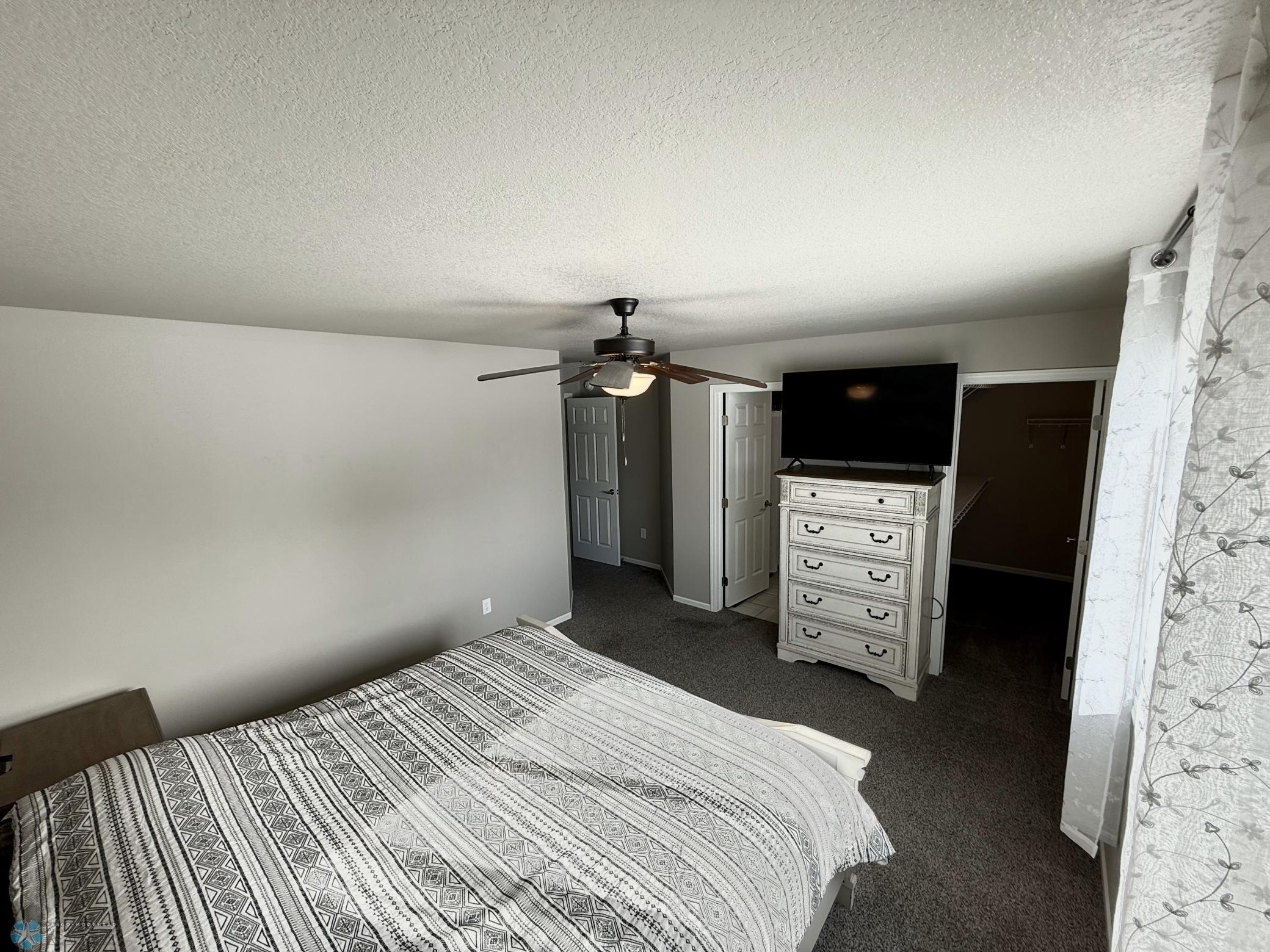 master bedroom has closet ensuite bath and small foyer from hall.jpeg