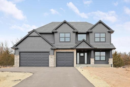 Front view of home capturing the striking dark exterior