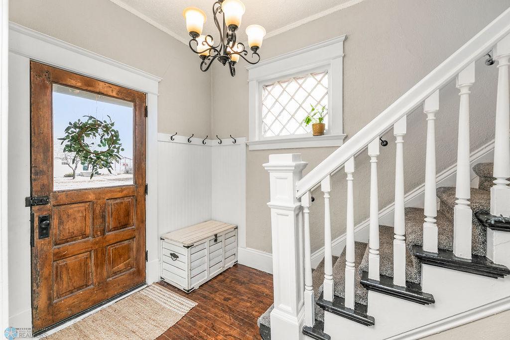 Foyer features a drop zone & charming window